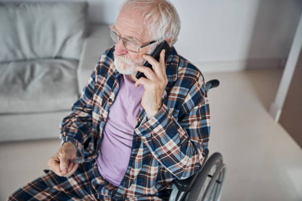 istock Caucasian male pensioner making a phone call 1283575878