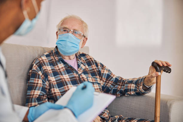 istock Geriatrician taking notes of the condition of an elderly man 1283575919