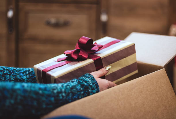 istock Young girl getting parcel during Christmas holidays 1283576207