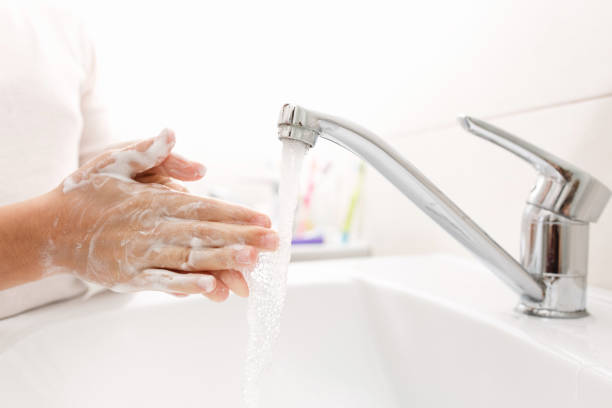 istock Washing hands in the bathroom. 1283578415