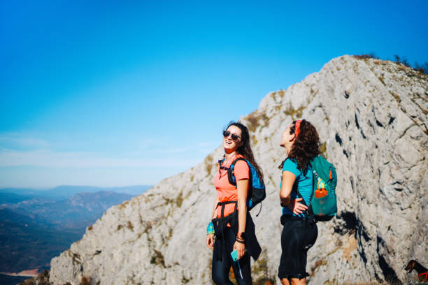 istock Young women hiking on the mountain 1283584665