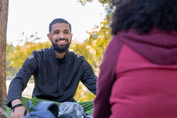 istock Middle Eastern man smiles while spending the day outdoors with his wife 1283584709