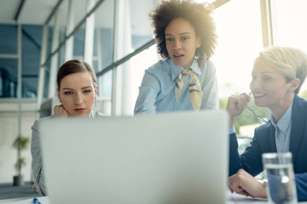 istock Female business team working on a computer in the office. 1283585729