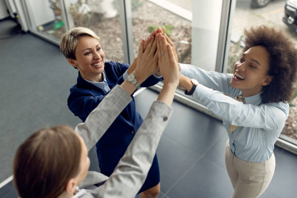 istock Unity of female business team! 1283585854
