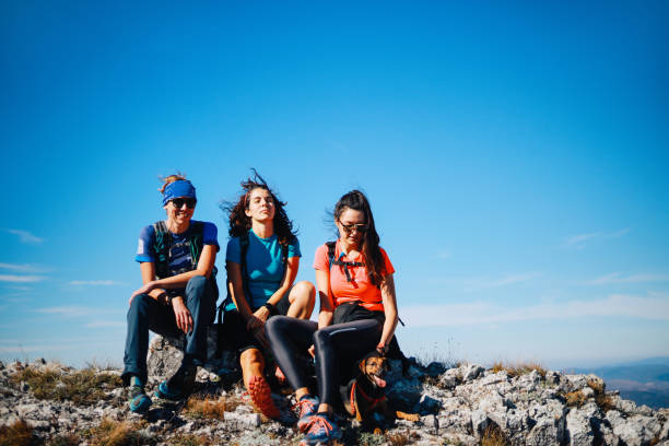 istock Young women resting from the hike 1283586805