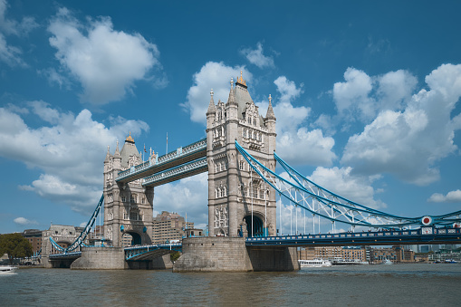 Tower Bridge in London on sunny day, the UK. View with beautiful clouds