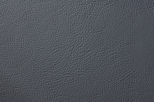 Abstract textured background of old leather gray color