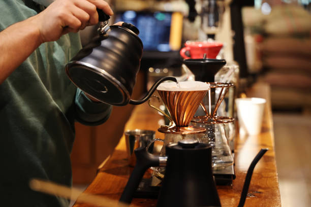 istock Barista at work in a cafe. Preparing pour over coffee 1283589410