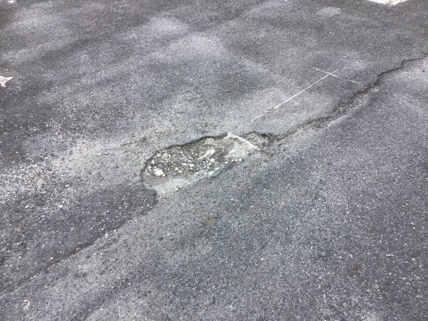 istock Cracked asphalt pavement in Japan 1283589485