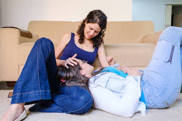 istock Same sex couple sitting talking 1283591220