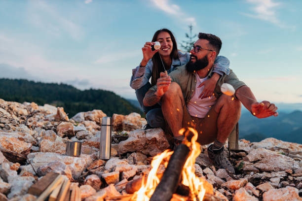 istock Roasting marshmallows by the campfire is their camping tradition 1283593301