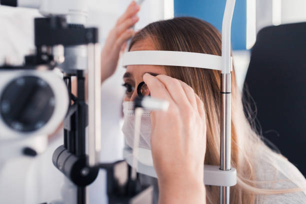 istock Young patient having dilated pupil fundus examination at doctor's office 1283594462
