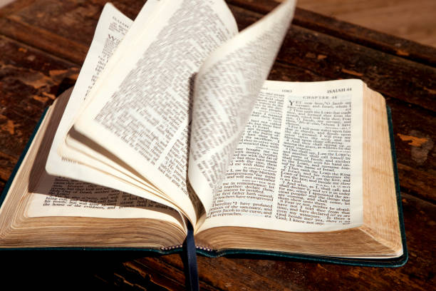 istock Open Bible with pages blowing in the breeze 1283597851