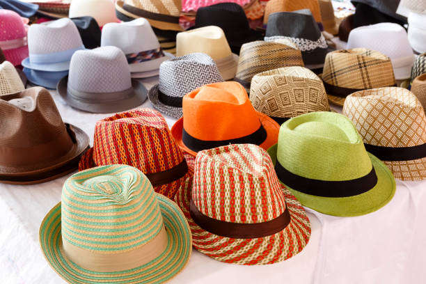 istock Fedora hats on display at an outdoor market 1283598849
