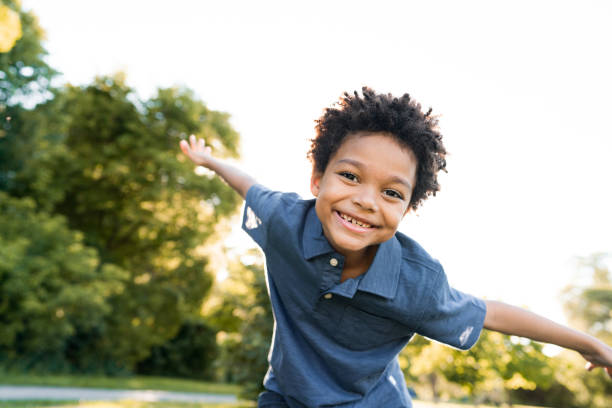 Happiness and wellbeing Happiness and wellbeing african american kids stock pictures, royalty-free photos & images