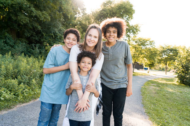Mom walking with sons outdoor