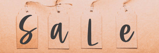 Word sale written on paper tags