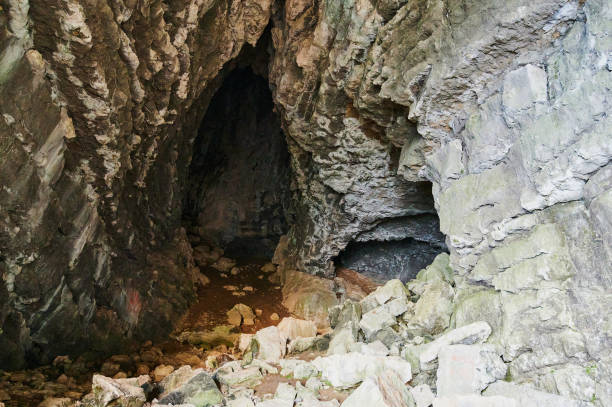 istock stone cave inside. view near the entrance. 1283600426