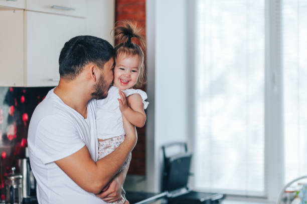istock happy family and father's day. 1283601330