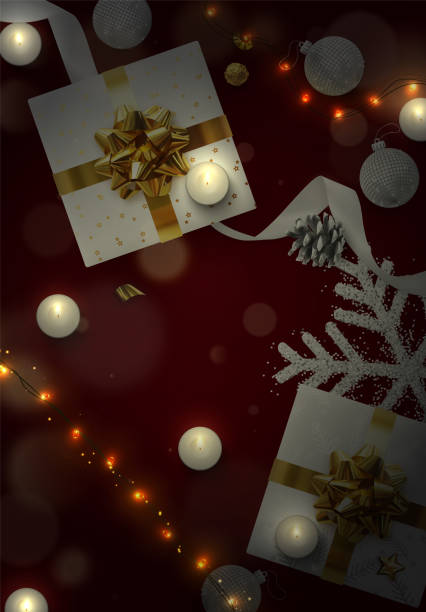 istock Happy New Year and Merry Christmas background. Top view of gift box, xmas decoration string lights garlands, balls and snowflakes. Creative greeting card, banner, web poster. Christmas design objects 1283602581