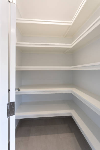 istock Empty cupboard pantry storage space in a newly renovated home 1283607998