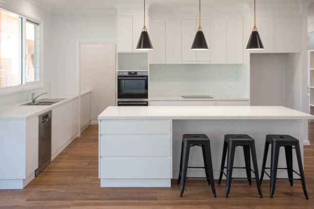 istock Stylish open plan kitchen in a newly renovated house 1283607999