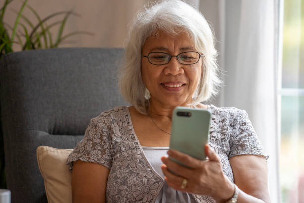 istock Senior woman on a video call 1283608682