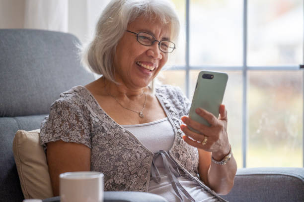 istock Senior woman on a video call 1283608685