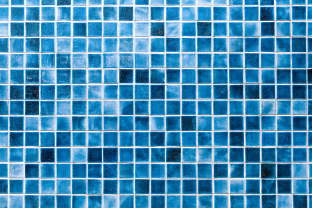 istock Pattern of Blue mosaic tiles on the wall texture background 1283609625