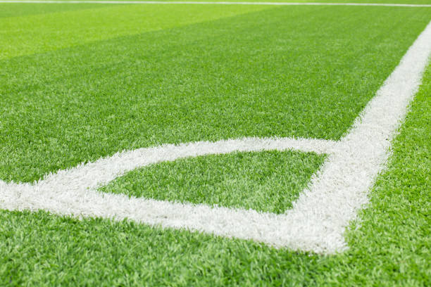 istock Corner kick on the football field texture background 1283609640