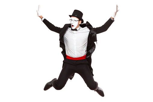 clown's body on red brick wall background