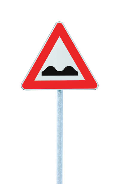 istock Uneven Road Sign, Red Triangle Frame, White Framed Signage, Grey Pole Post, Isolated Vertical Closeup, 1283622929