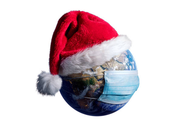 Earth With Surgical Mask and Santa Hat - Virus Infection Covid 19 - World with Coronavirus - Christmas Concept 3D Illustration Earth map developed from NASA source data on https://visibleearth.nasa.gov/collection/1484/blue-marble tierra con máscara quirúrgica y sombrero de santa - infección por virus covid 19 - mundo con coronavirus - christmas concept 3d mapa de la tierra desarrollado a partir de los datos de origen de la nasa en https://visibleearth.nasa.gov/colle