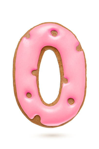 istock Number 0 pink gingerbread biscuit isolated on white. 1283624233