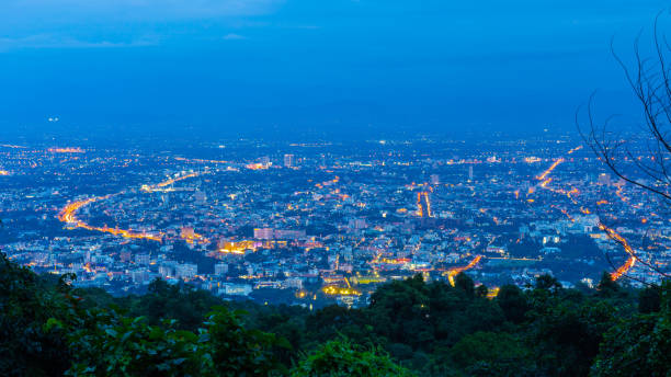 chiang mai city from the viewpoint on doi suthep is a city highly defined by tourists visiting thailand. - suthep imagens e fotografias de stock