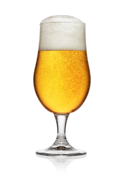 istock Glass of light yellow beer isolated on white. 1283624887