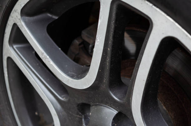 istock Wheel rim with scratches and dirt. 1283626175