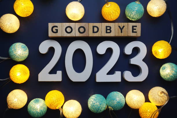 istock Goodbye 2023 alphabet letter with cotton ball LED decoration on blue background 1283628568