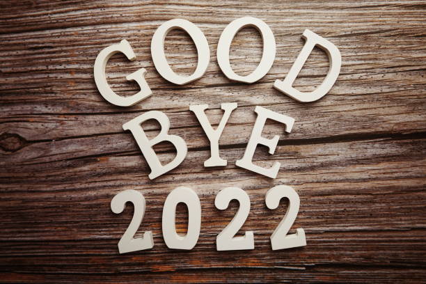 istock Goodbye 2022 alphabet letter on wooden background 1283628594