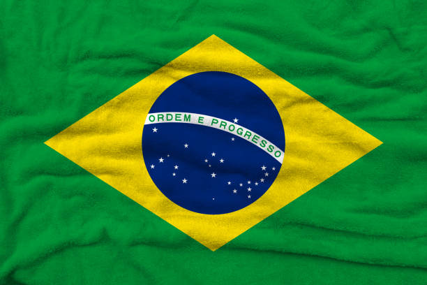 istock National flag of Brazil on fabric texture. 1283628630