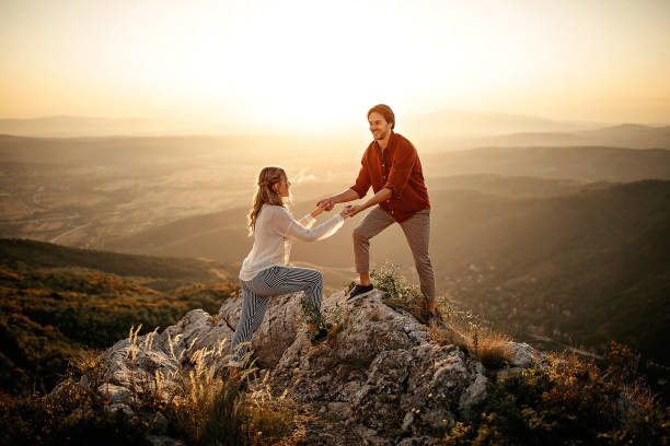 istock Couple walking on mountain, having a good time 1283633044