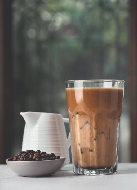 istock ice coffee with coffee beans and milk food background 1283638398