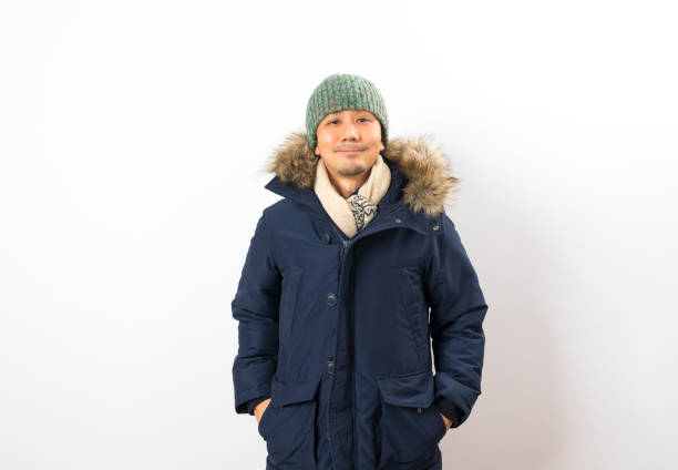 istock Handsome asian man dressed with winter clothing 1283640340