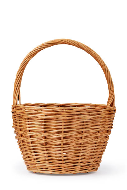 wicker basket for berries made of willow twigs, isolate on a white background wicker basket for berries made of willow twigs, isolate on a white background moses basket stock pictures, royalty-free photos & images
