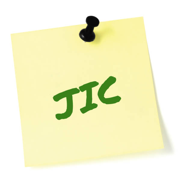 istock Just in case initialism JIC green marker written acronym text, isolated yellow post-it to-do list sticky note reminder abbreviation sticker, black pushpin thumbtack macro closeup, memo information message, newsletter bulletin info notice concept, letter d 1283641326