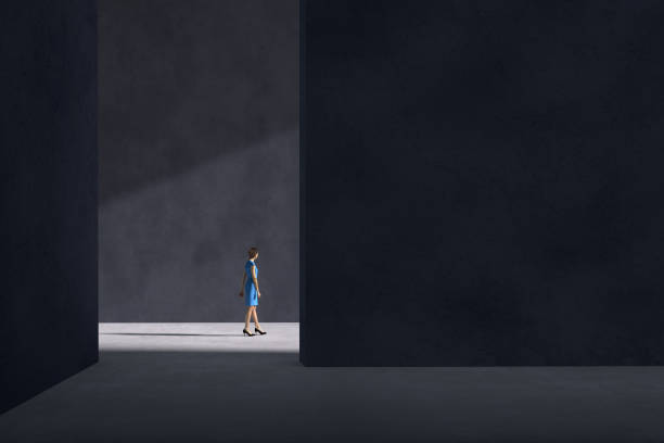 istock Business woman walking towards the sunlight 1283665488