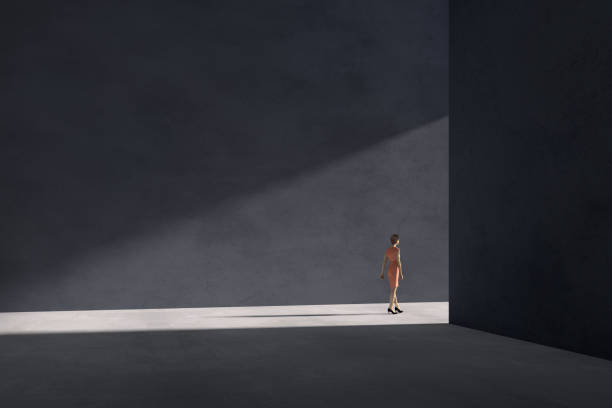 istock Business woman walking towards the sunlight 1283665490
