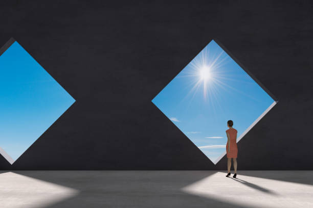 istock Business woman walking towards the sun 1283665496