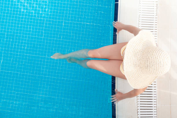 istock Woman relaxing in swimming pool 1283665809