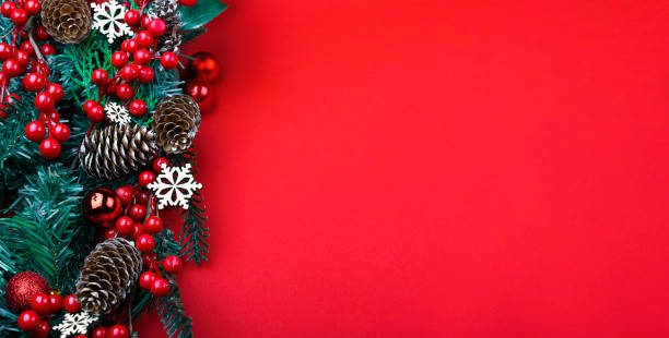 istock Christmas decorations on the red background. Top view with copy space for your text. 1283666060